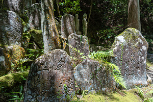Engraved stones and statues at Mitaki-Dera temple in Hiroshima,, an Arts & Entertainment Photo by GoodGoods