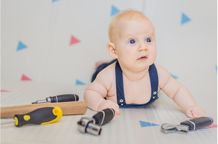 Adorable baby in a mechanic costume