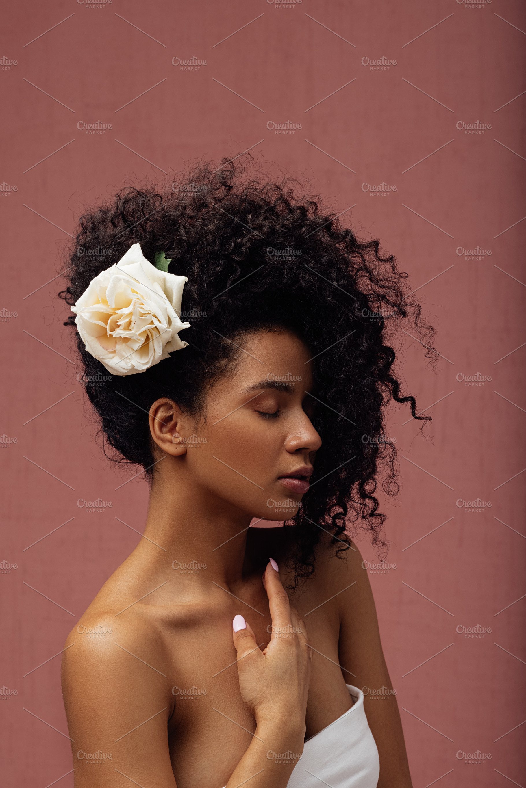 Young slim female with a flower, a Person Photo by Artem Varnitsin