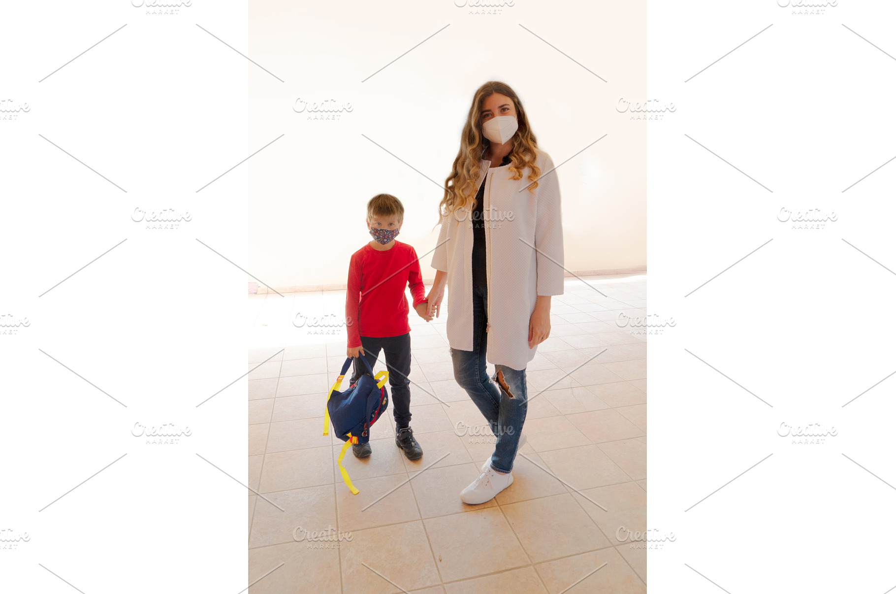 Mother and boy going to school, a Person Photo by Neirfy