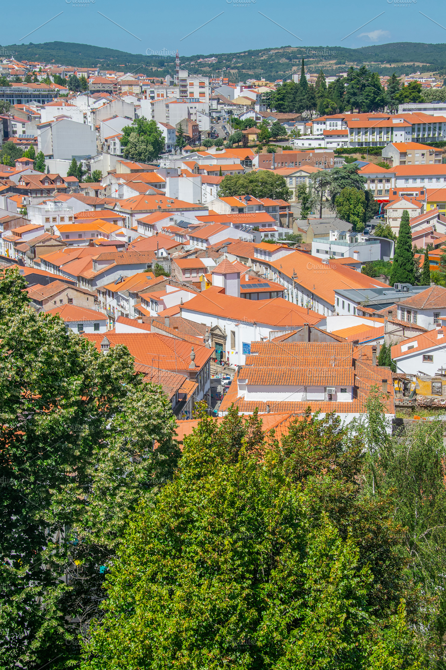 Aerial view of rooftops in braganca city, portugal, an Architecture Photo by DanFLCreativo