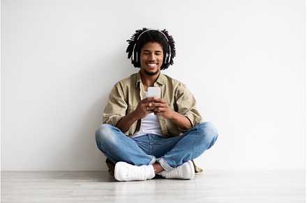 Gadgets For Leisure. Smiling Black, a Technology Photo by Prostock-Studio