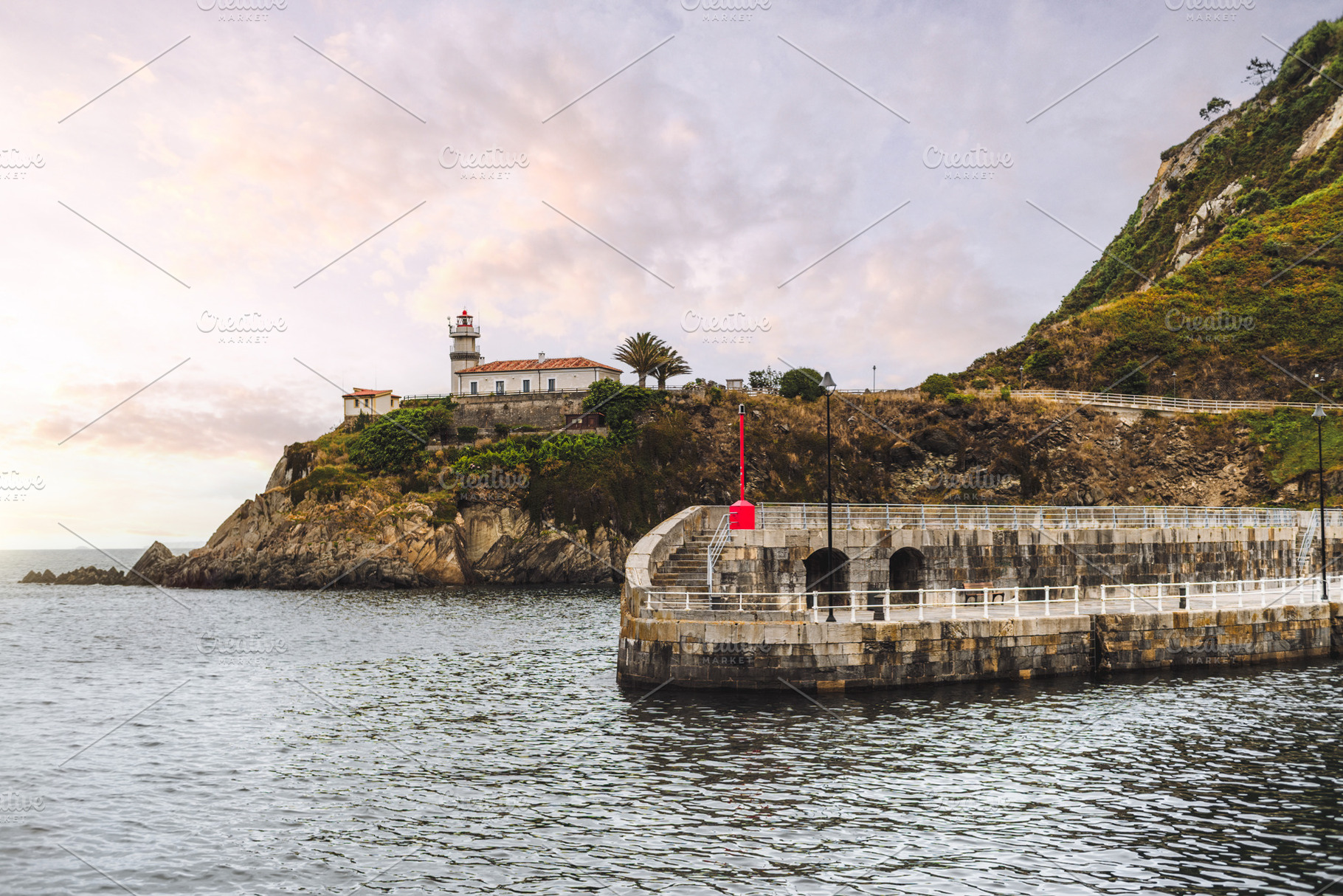 Lighthouse on Cudillero coast, an Architecture Photo by SkyNext