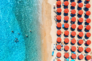Aerial view of colorful umbrellas on, a Nature Photo by den-belitsky