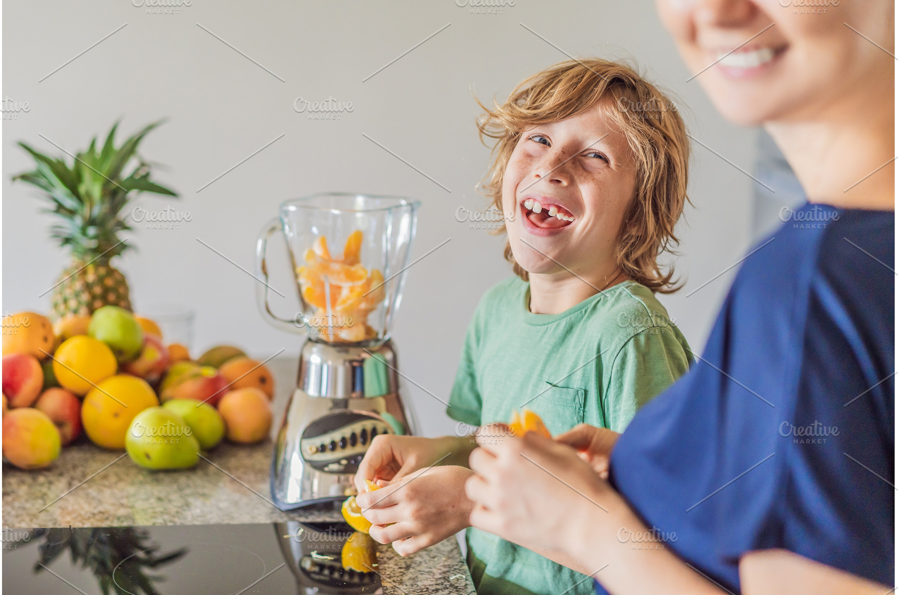 Mother and son cooking together in, a Person Photo by Elizaveta Galitskaya