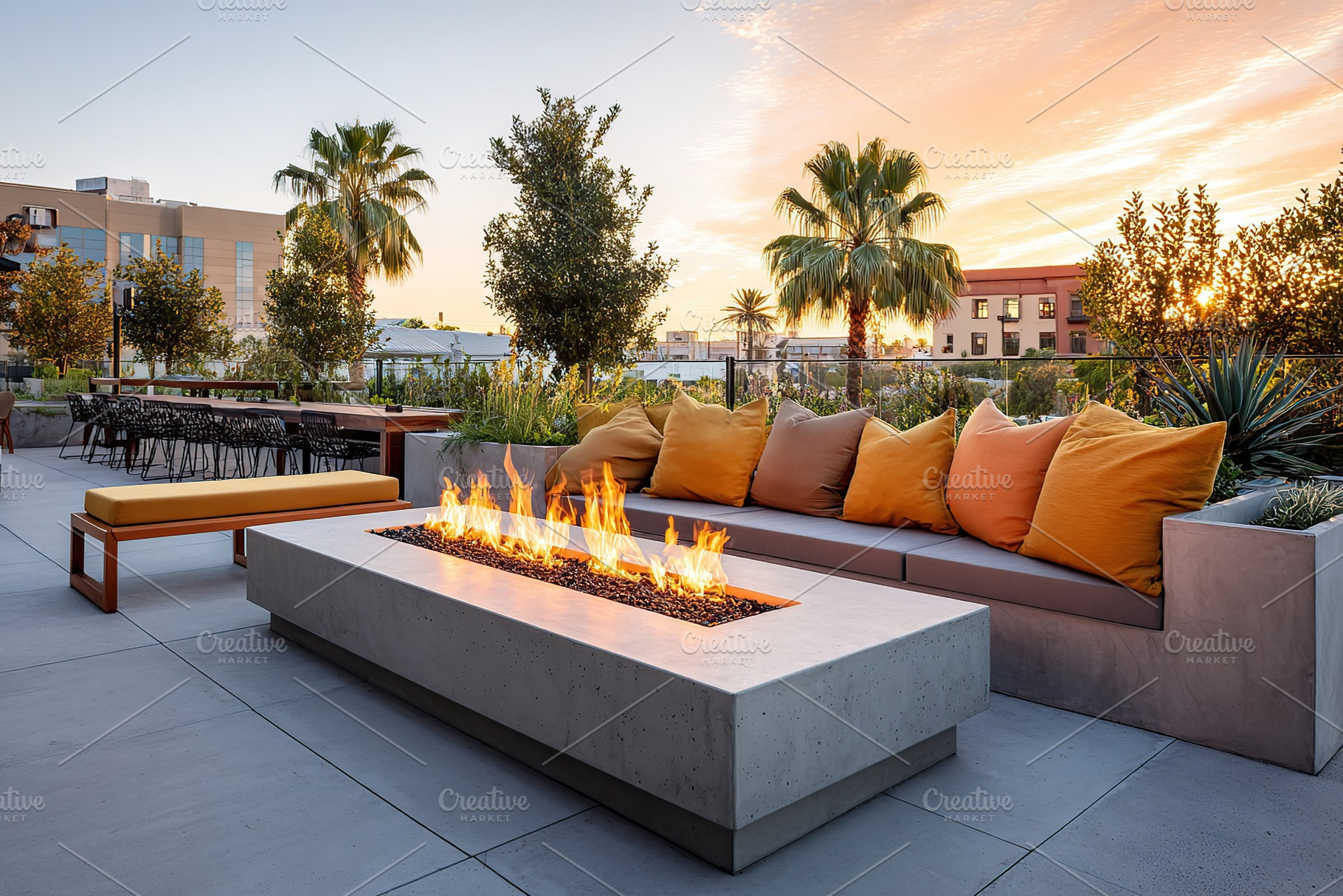 Elegant firepit area with smart seating under a vibrant sunset sky in an urban, a Photo by AlyaAnd