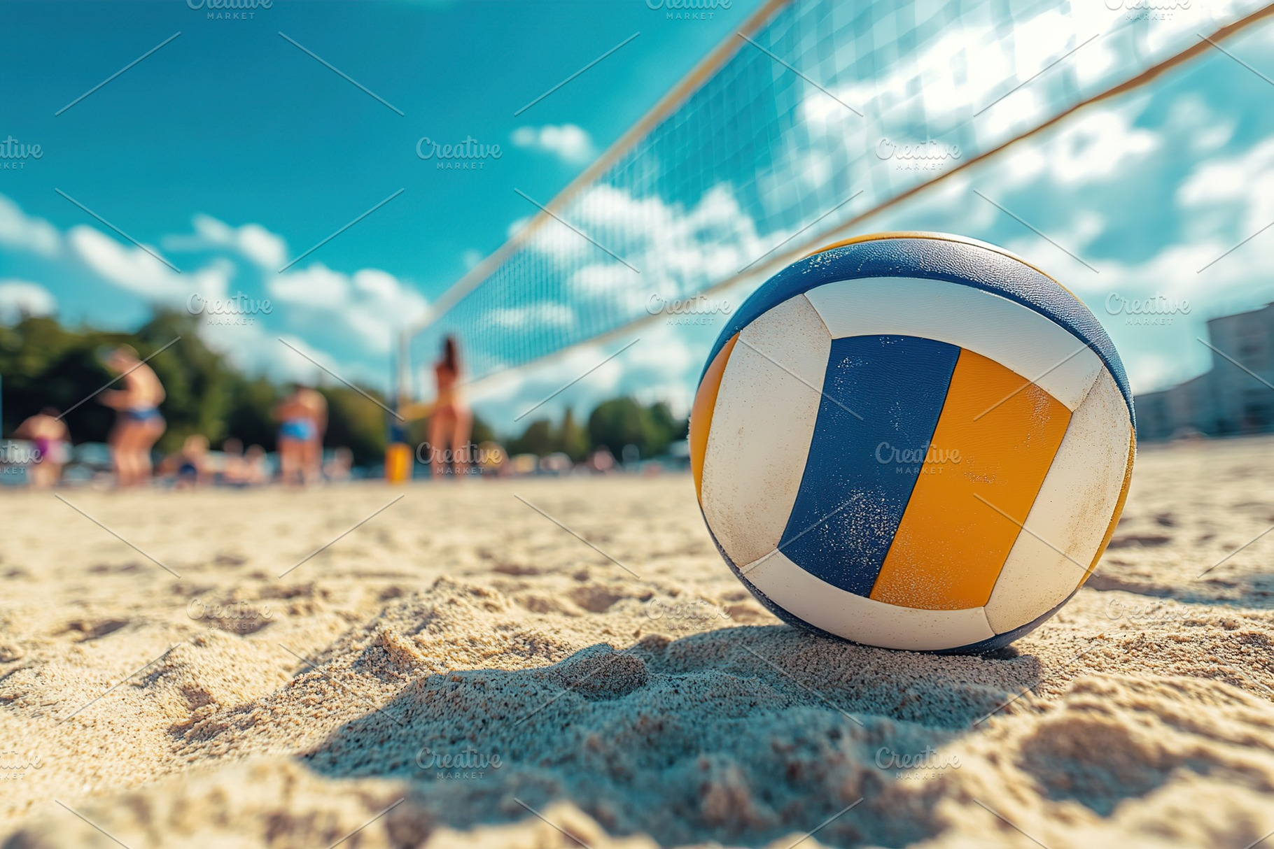 Volleyball on sandy beach with players in the background during a sunny day, a Photo by AlyaAnd