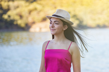 Portrait of a beautiful brunette girl wearing a pink top, a Person Photo by José Manuel Gelpi