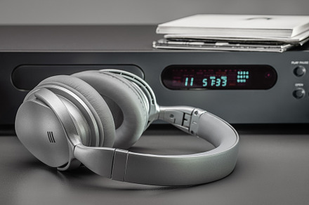 Music player, CD and headphones.
