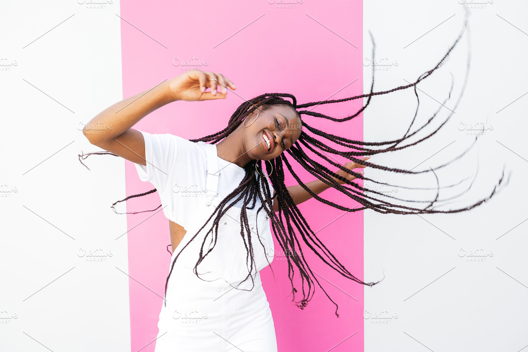 Young happy girl with braided hair, a Person Photo by Artem Varnitsin
