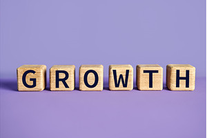 Wooden blocks spelling the word, a Business Photo by Gladkov photography