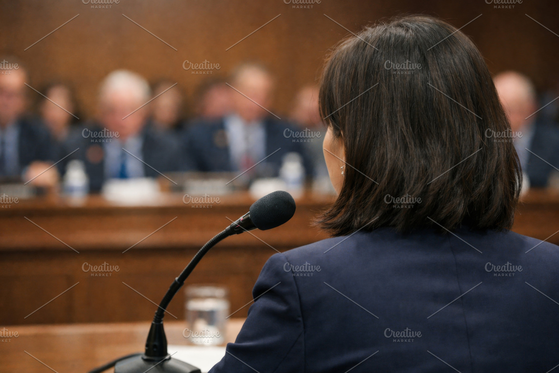 Female speaker addressing formal aud, a Photo by Dvoevnore photos