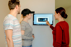 Smart home installation with wall mounted touchscreen, a Photo by DanFLCreativo
