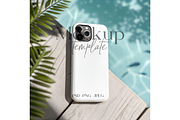 iPhone Cover Mockup by the Pool, a Product Mockup by MockupWizard (Thumbnail 1 of 5)