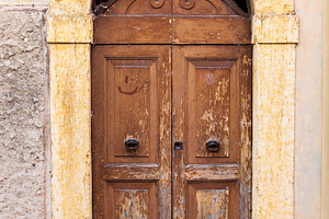 Weathered wooden doors in Italy, an Architecture Photo by BOOCYS