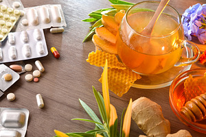Comparison between chemical medicine and herbal medicine on wood, a Food & Drink Photo by Davizro's Market