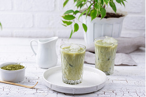 Cold matcha tea with milk and ice, a Food & Drink Photo by Yulia Furman