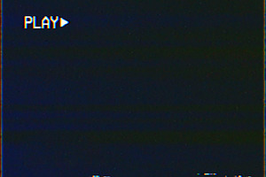 Blank vhs screen with play symbol ba