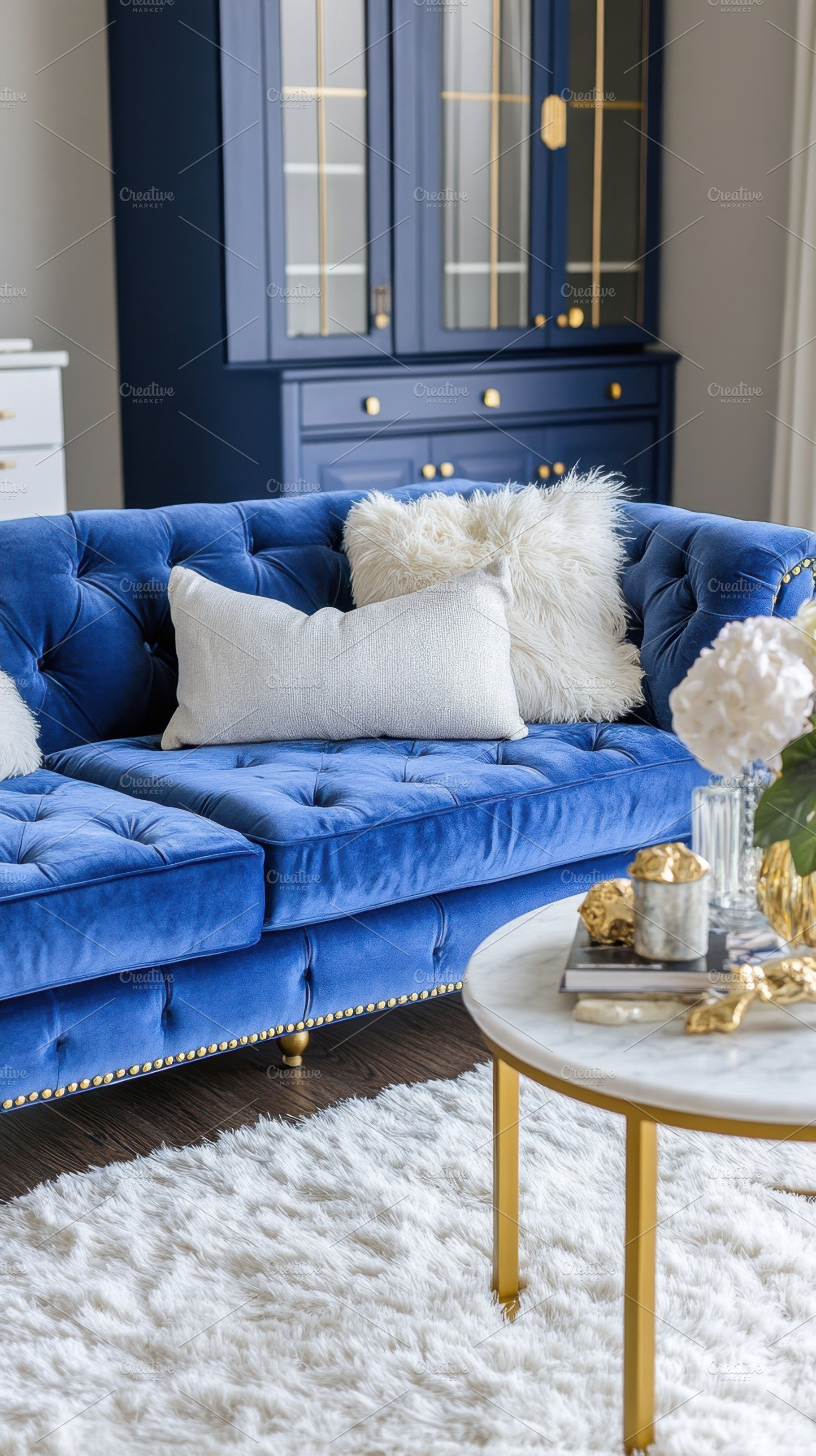 Chic blue couch in modern room, a Photo by Beautiful things
