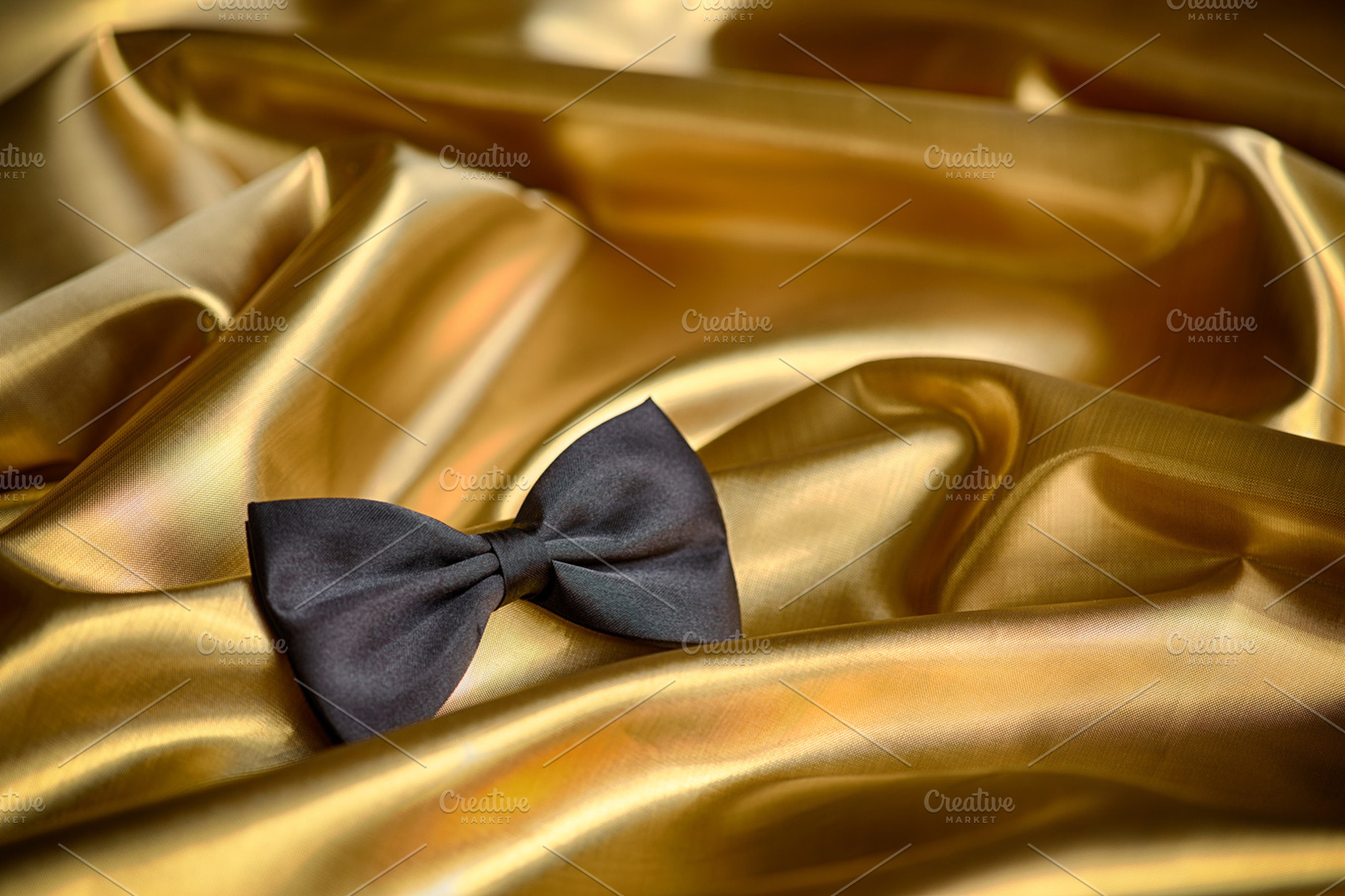 Black bow tie, a Background Photo by Pakete Art