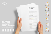 A4 Paper in Hands Mock-up, a Print Template by Branda Keeps (Thumbnail 1 of 16)