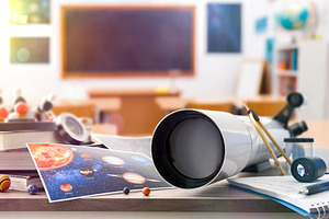 Astronomy student table with materials and tools and classroom b, a School & Education Photo by Davizro's Market