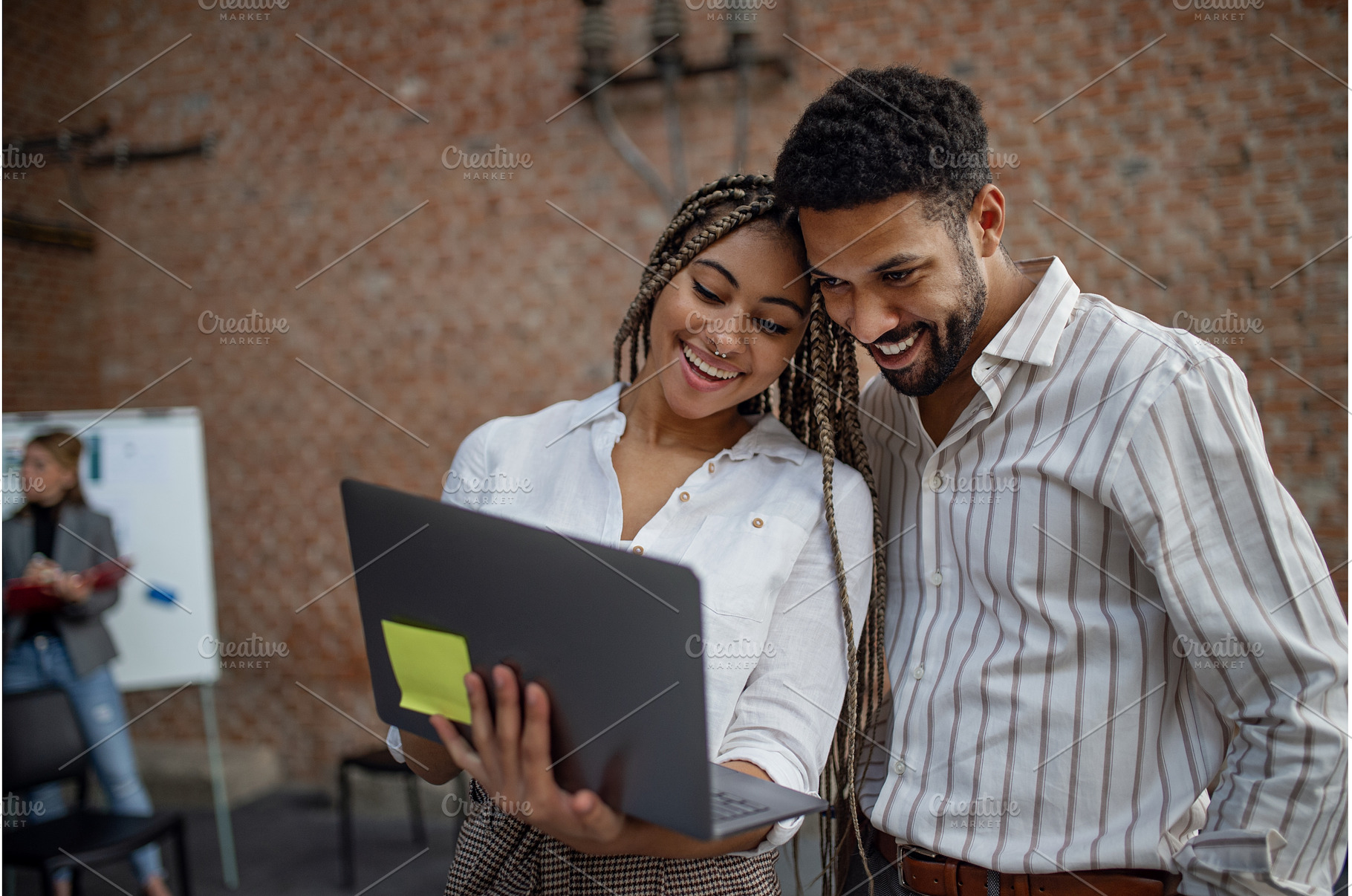 Cheerful young businesspeople with, a Person Photo by HalfPoint