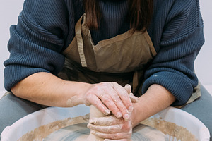 Ceramic artist working pottery manufacturing woman, an Arts & Entertainment Photo by Photo Drive Studio
