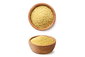 Full plate of millet seeds and a top, a Food & Drink Photo by innakreativ