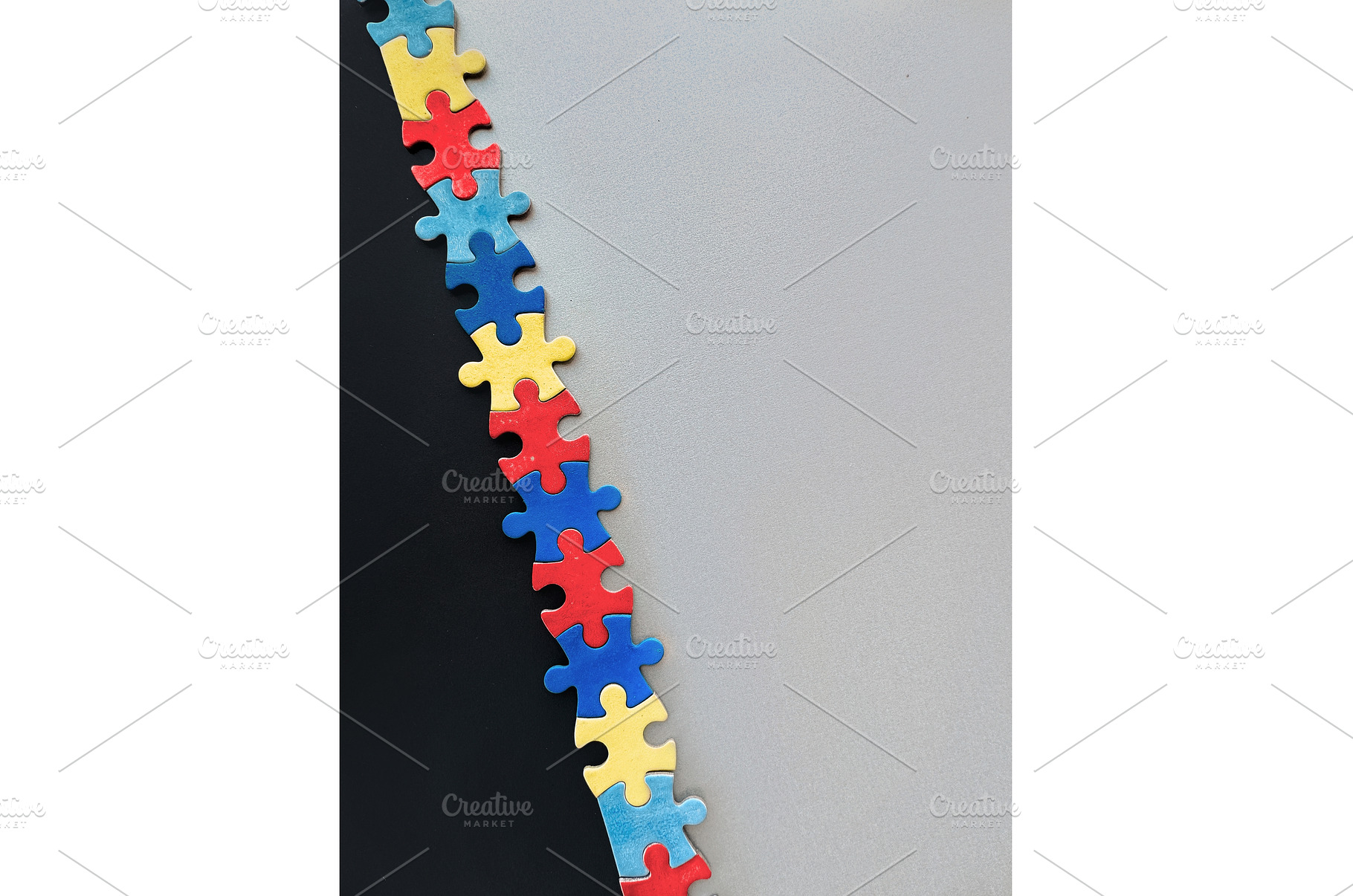 Colorful interlocking puzzle pieces, a Photo by tilialucida