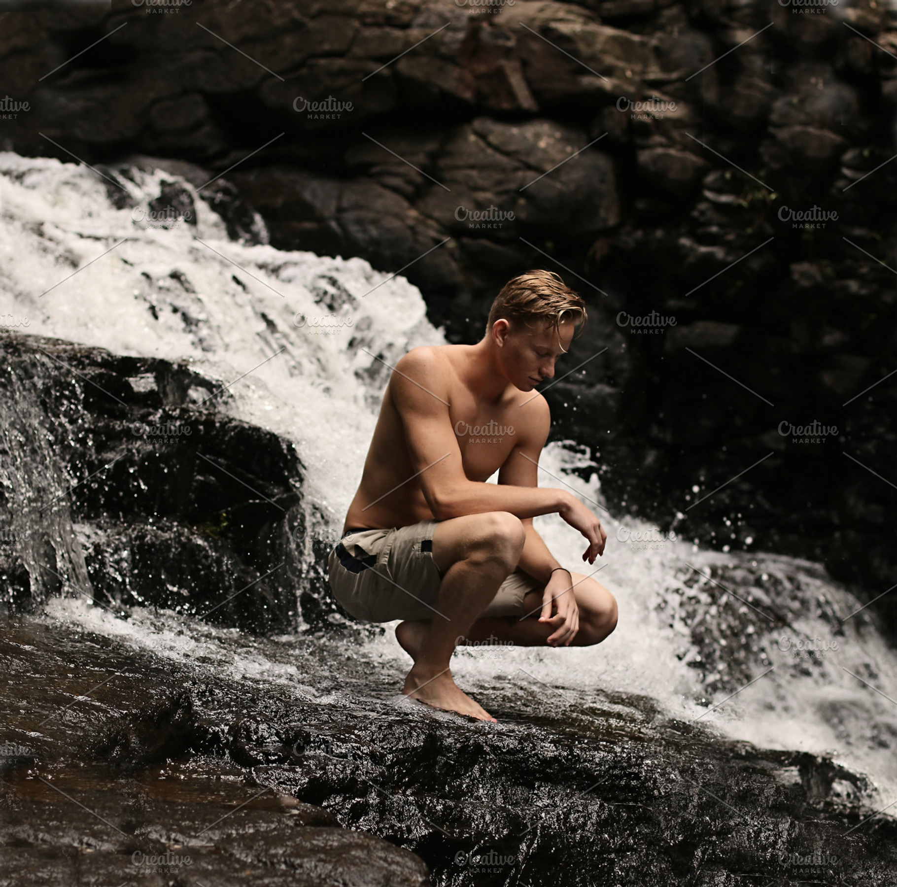 Shirtless Man at Waterfall alone, a Person Photo by Chris Joel Campbell