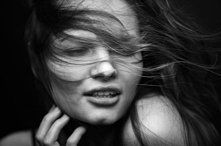 Dramatic black and white portrait of stock photo containing face and natural