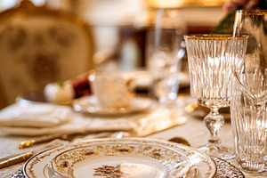 Luxurious fine dining table setting in an elegant restaurant, pr, a Food & Drink Photo by Studio ANNA