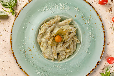 Delicious penne pasta with cheese sauce