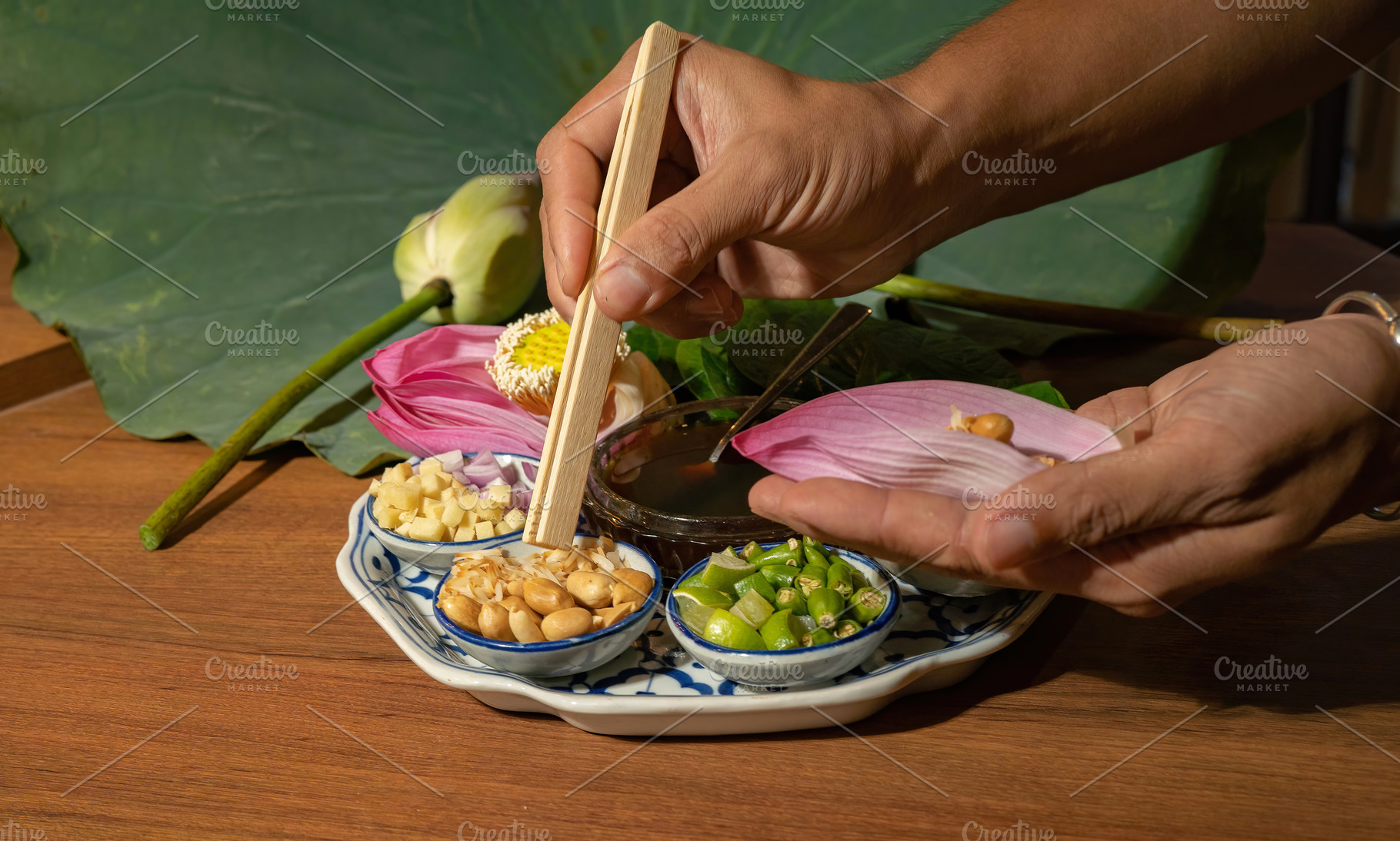 A set of Miang kham, Thai appetizer food with Lotus flower and l, a Background Photo by Tampatra
