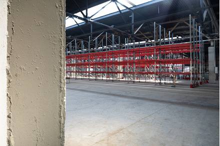 Warehouse with empty high pallet, an Industrial Photo by Jan Jack Russo Media