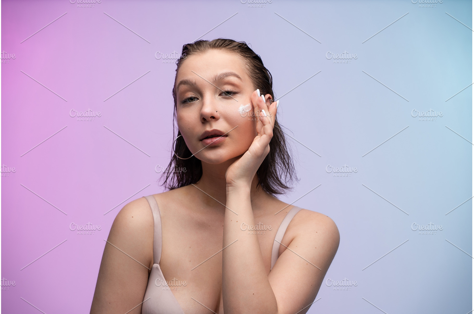 Young woman applying white, a Person Photo by volodymyrshtun13795