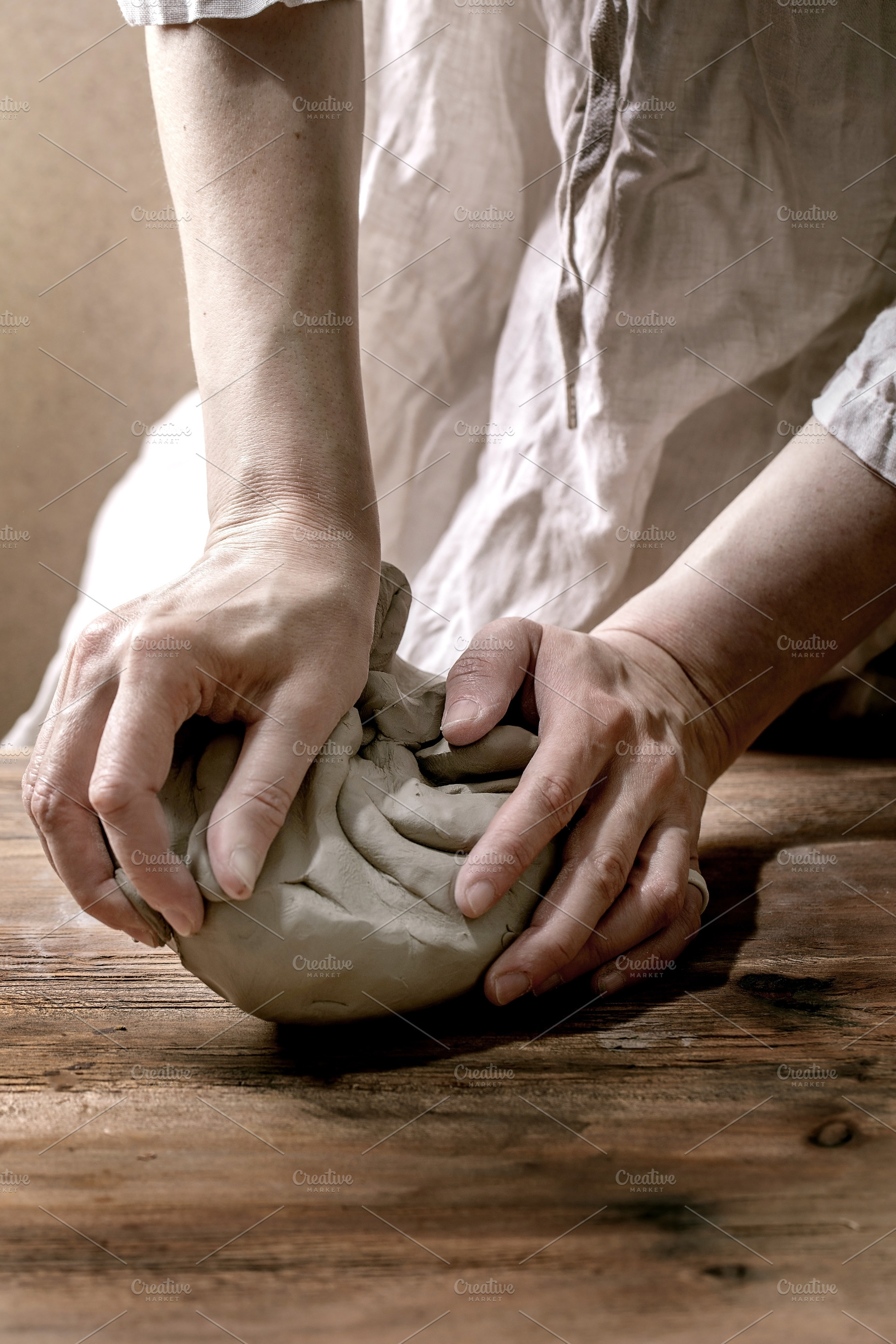 Pottery clay in femail hands, a School & Education Photo by Natasha Breen