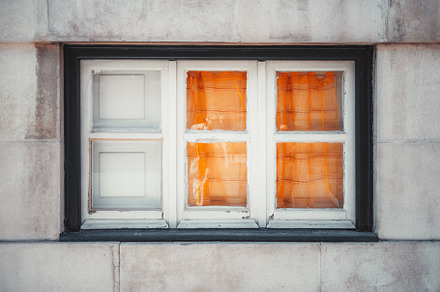 Old window with orange curtains, an Architecture Photo by SkyNext