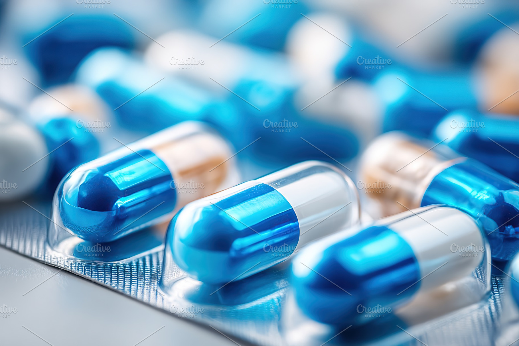 Close-up macro shot of two-tone capsules arranged on a surface, a Photo by AlyaAnd