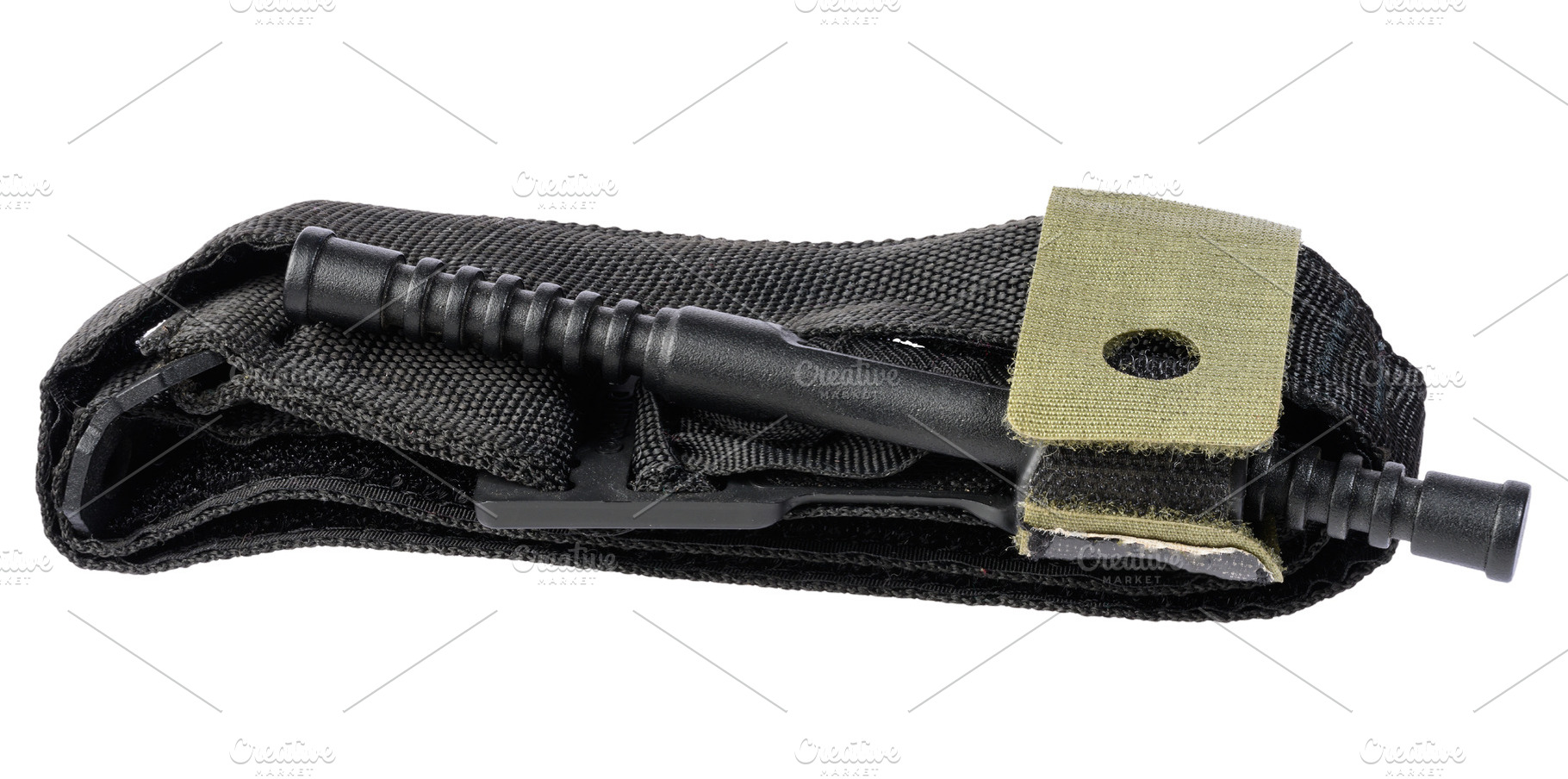Modern tactical hemostatic tourniquet folded on an isolated back, a Health & Medical Photo by ndanko