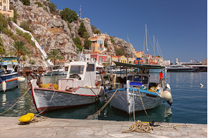 Fishing boats moored in Symi harbor, an Architecture Photo by kavalenkava