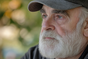 Closeup view of an elderly man with, a Photo by Pavel_design