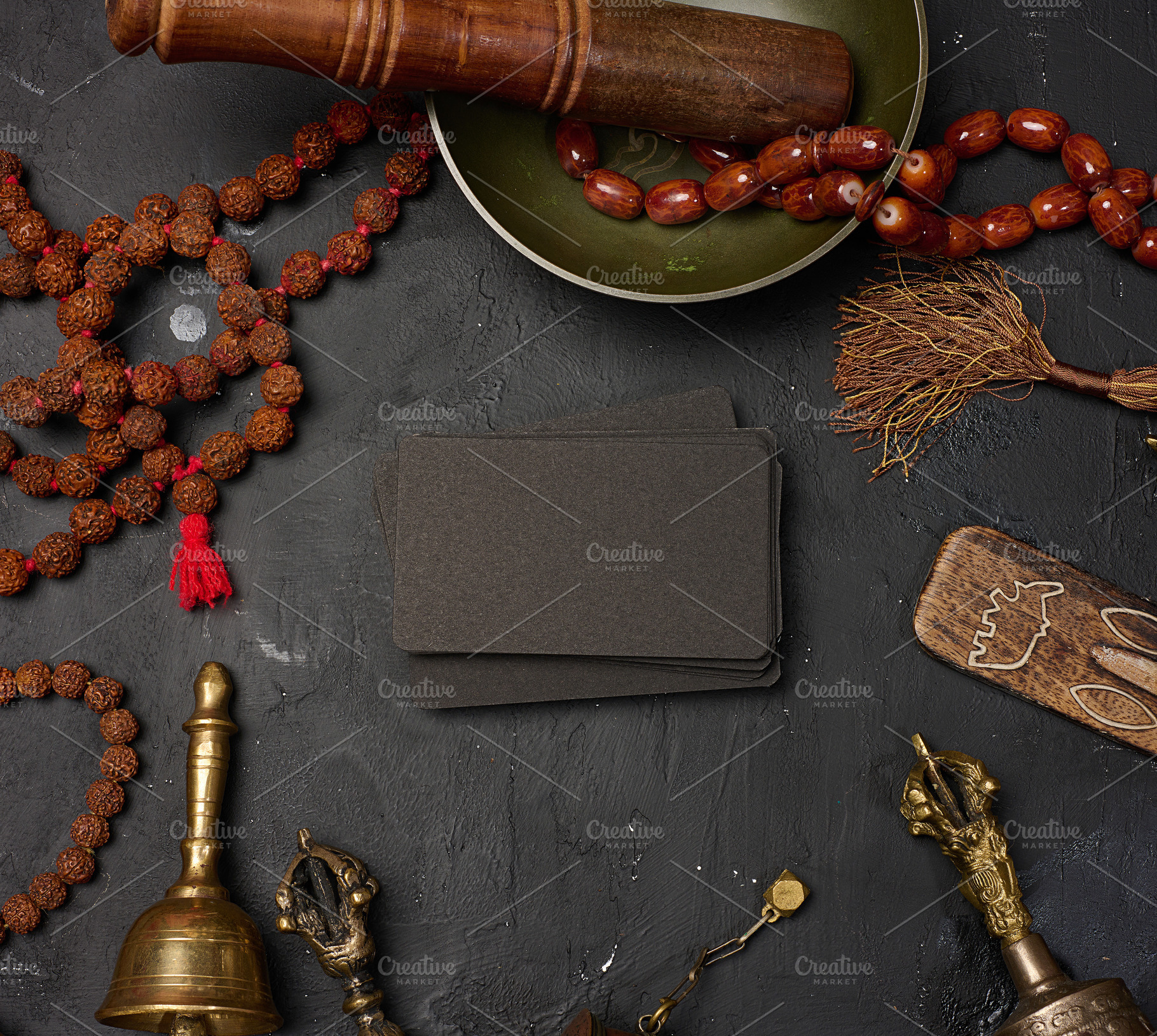 Blank black business cards in the center surrounded by a Tibetan, a Health & Medical Photo by ndanko
