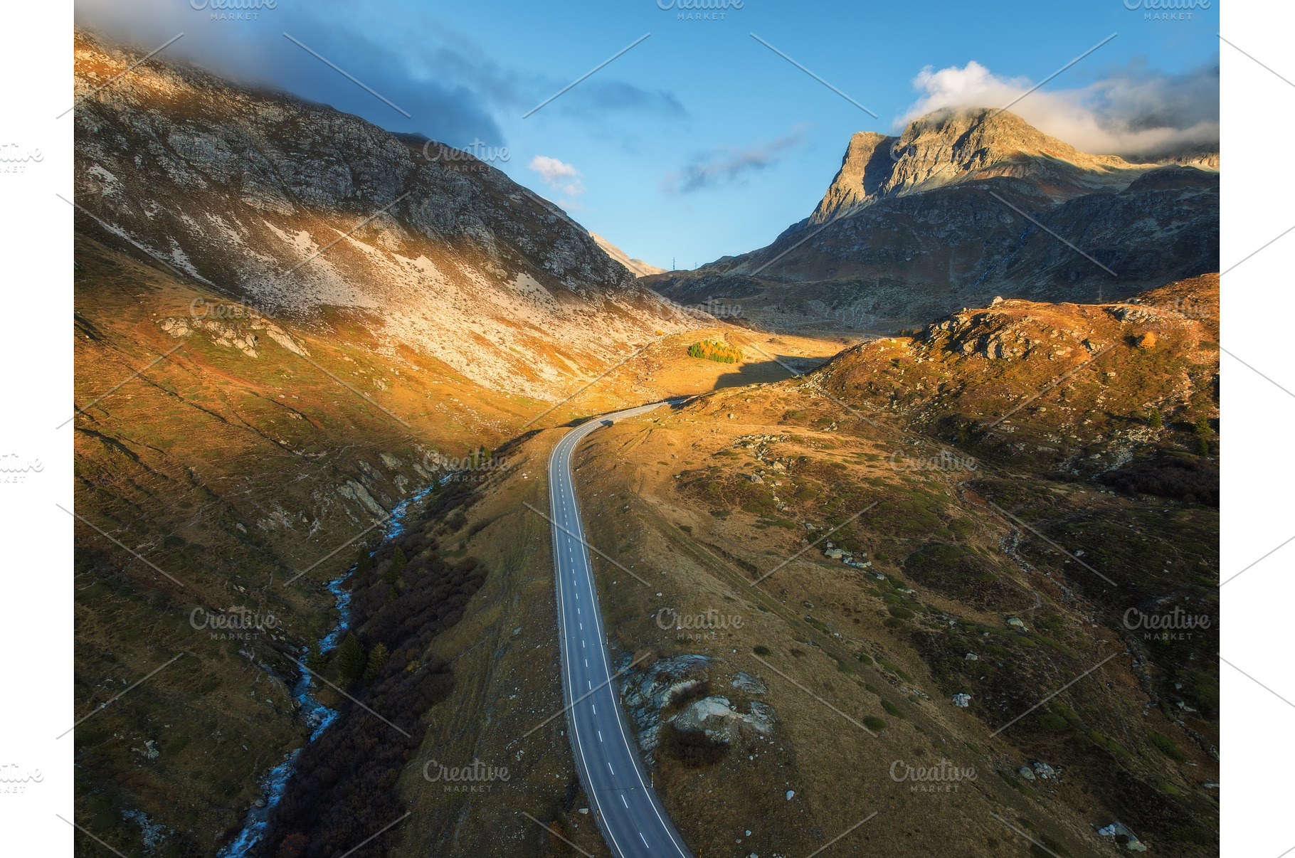 Aerial view of winding road in high, a Nature Photo by den-belitsky