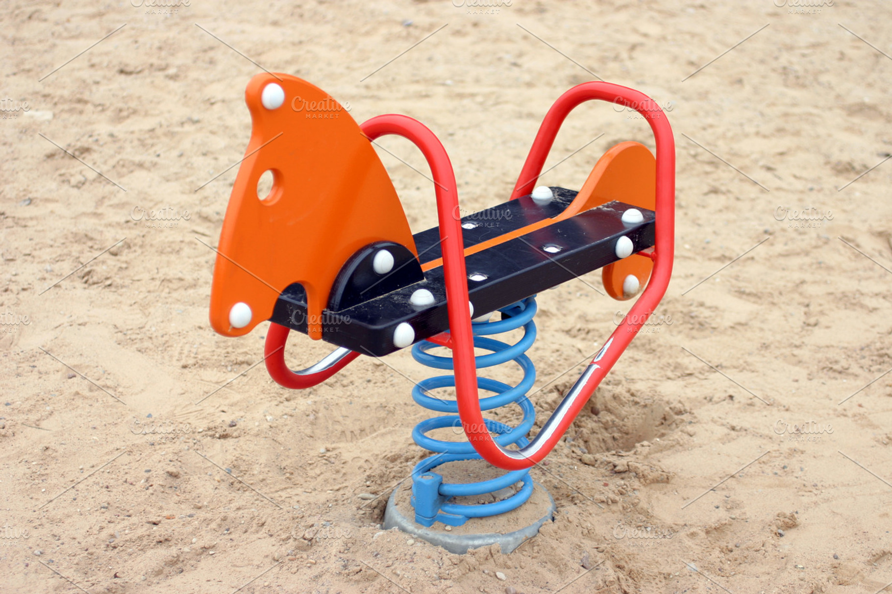 Rocking horse in playground, an Arts & Entertainment Photo by BOOCYS