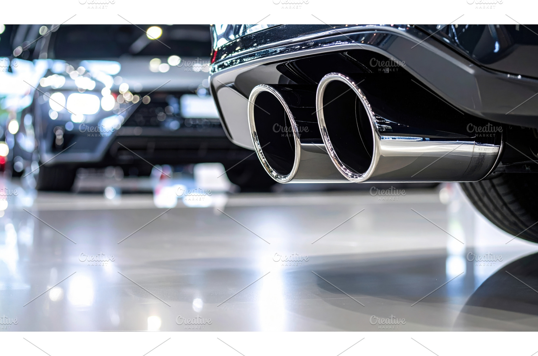 Close-up of dual exhaust pipes on, a Transportation Photo by Igor Tichonow
