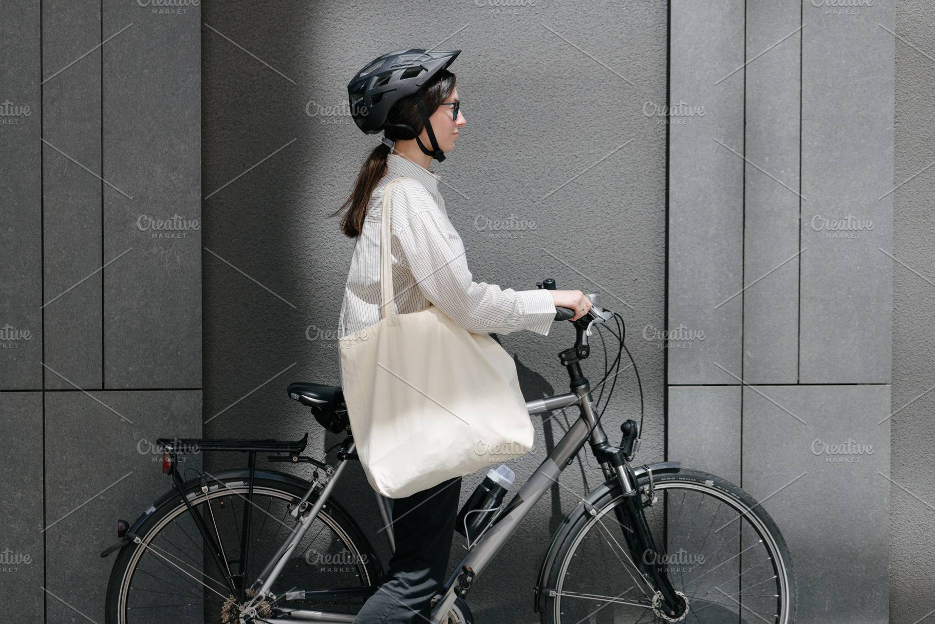 Woman holding eco bag or cotton tote, a Beauty & Fashion Photo by 5max