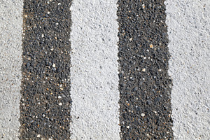 Textured Road Surface with Stripes, a Background Photo by AlyaAnd