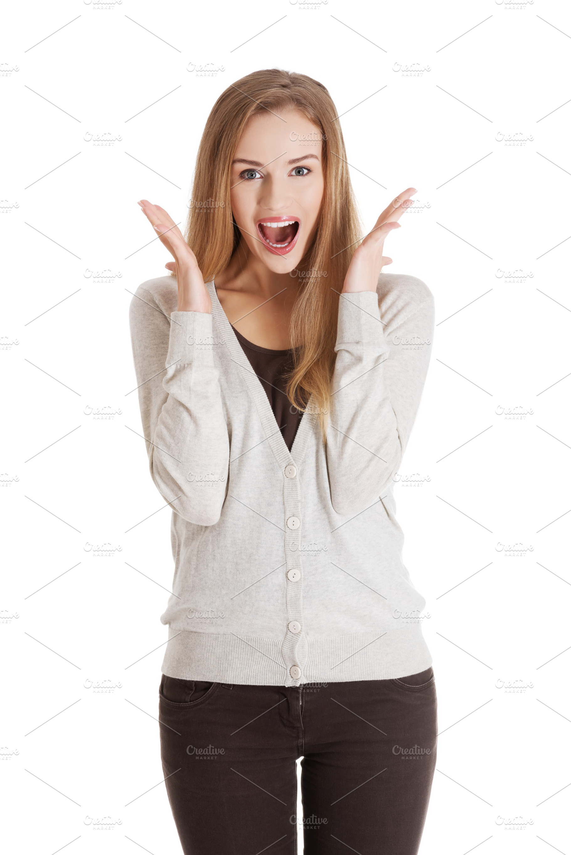 Beautiful positive and casual woman expressing surprise containing happy, a Person Photo by PhotoMediaGroup